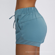 Shorts de yoga de couleur unie chaude